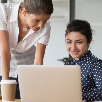 A Patelco home loan consultant helps a member prepare to buy a new home.